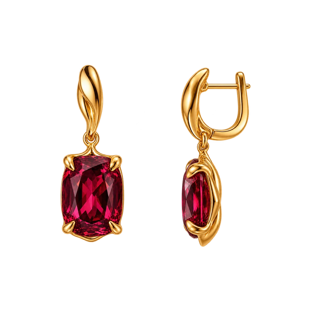 A pair of gold drop earrings, each holding a cushion rubellite in four claws